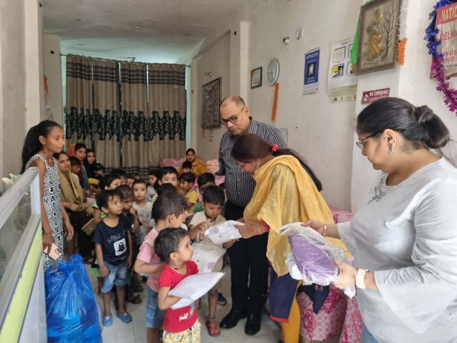 Cloths Distribution between the Children